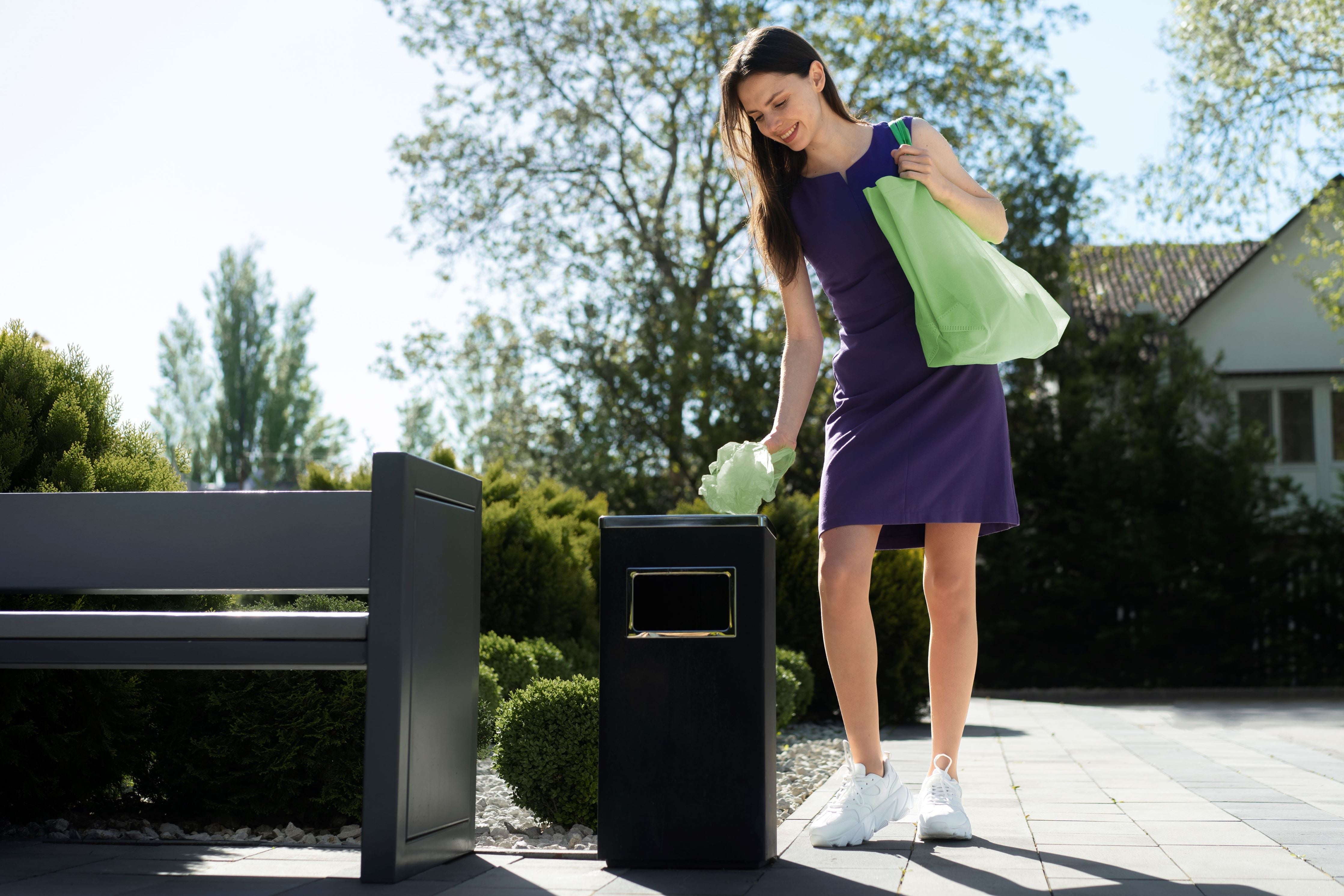 Woman throwing something away